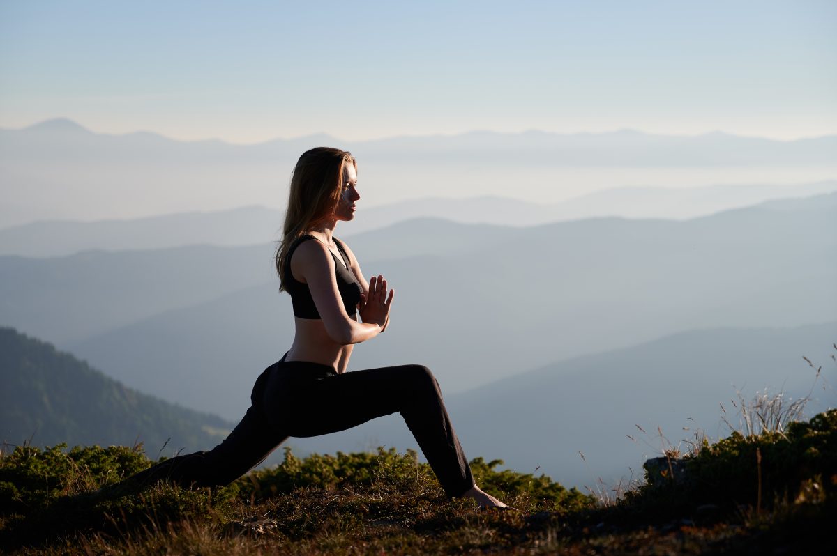 attractive-woman-doing-exercises-nature-1200×798